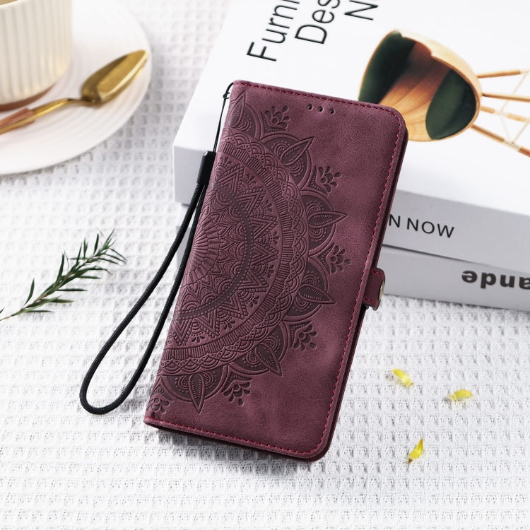 For iPhone 16 Plus Skin Feel Totem Embossed Leather Phone Case(Wine Red) - iPhone 16 Plus Cases by buy2fix | Online Shopping UK | buy2fix